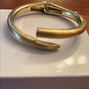 Gold tone hinge bracelet clamper brutalist design minimalist tech industrial